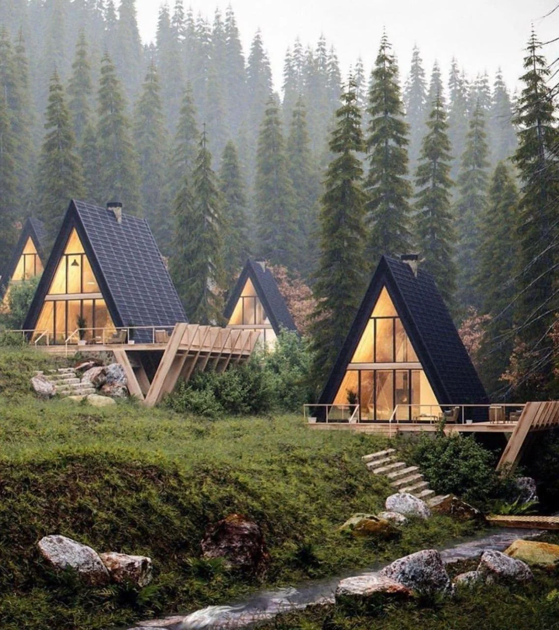 Несколько домов A-Frame в хвойном лесу у ручья